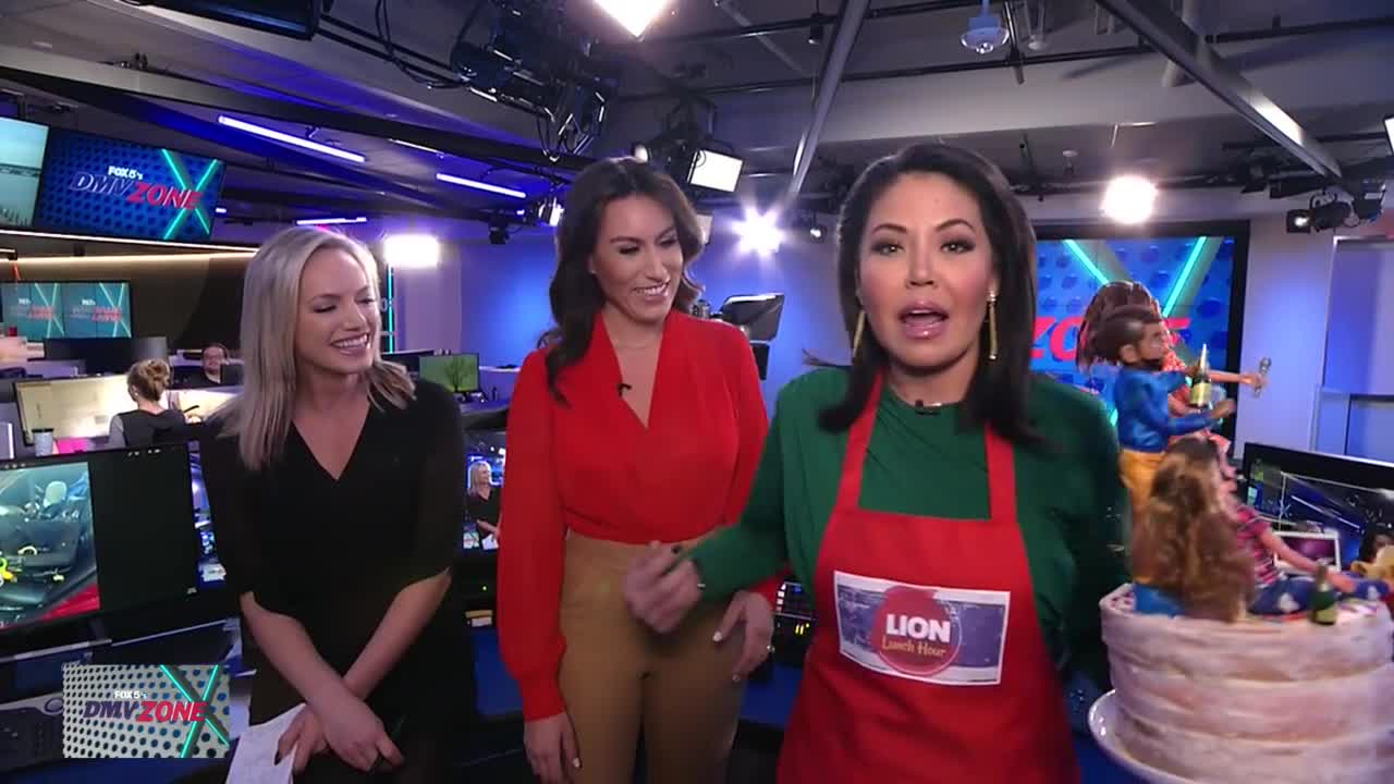 Angie surprises Marina and Joe with a cake to celebrate DMV Zone!