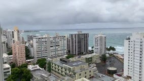 Dark clouds gather as Puerto Rico preps for Tropical Storm Laura