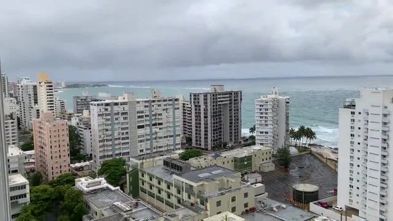 Dark clouds gather as Puerto Rico preps for Tropical Storm Laura
