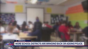 More school districts are bringing back or adding police officers