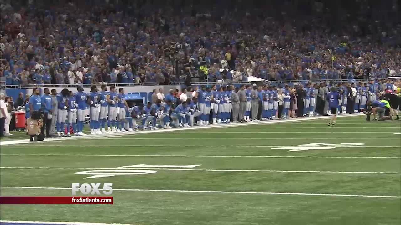 Arthur Blank, Falcons lock arms on field for National Anthem, two kneel