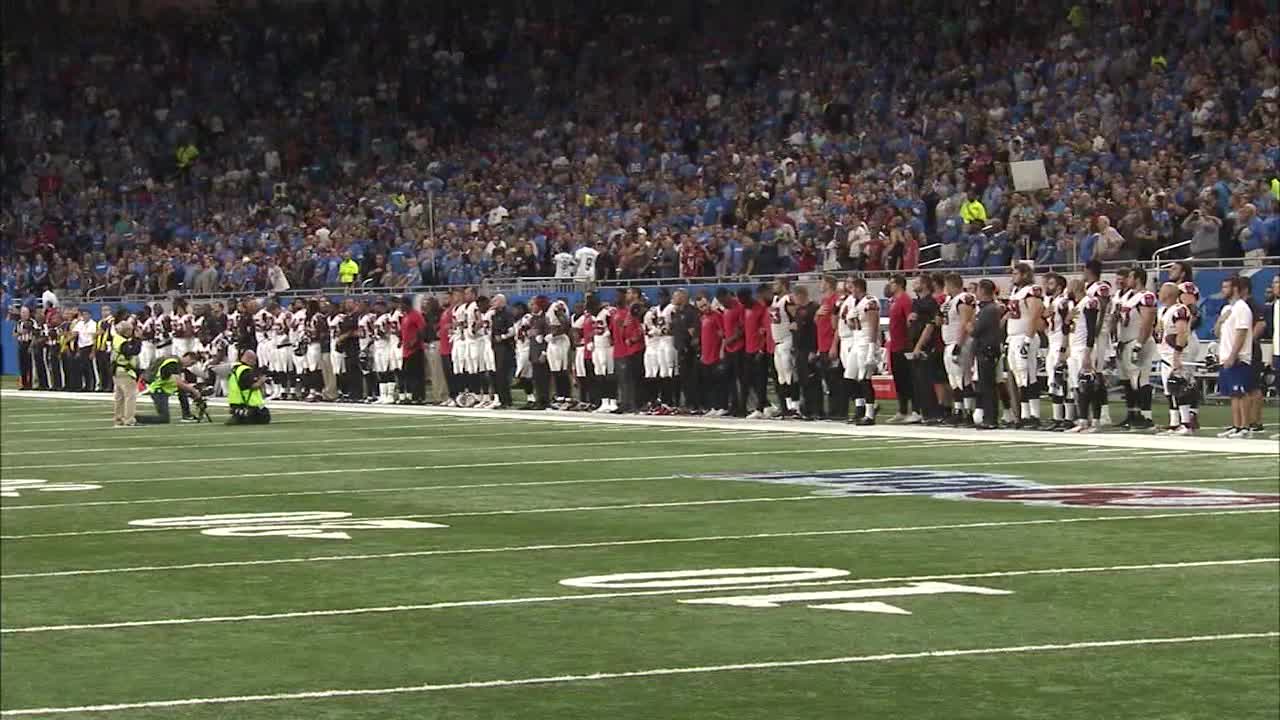arthur Blank, Falcons lock arms on field for National Anthem, two kneel
