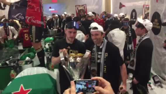 Atlanta United celebrates in the locker room following MLS Cup victory