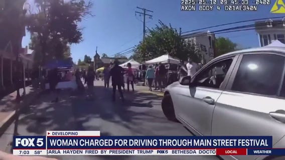 Woman hits officer, drives into Laurel Main Street Festival