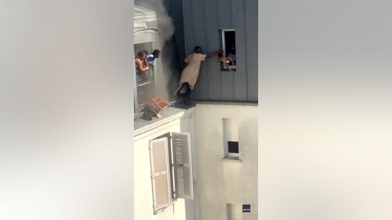 WATCH: Hero rescues infants from apartment fire