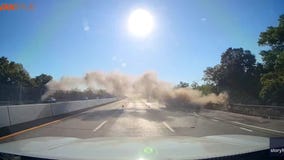WATCH: Car flies over busy highway