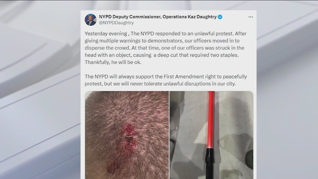 Officer struck in head during 'unlawful protest'