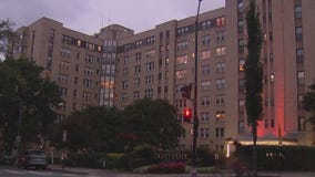Woman's arm trapped in elevator, residents concerned