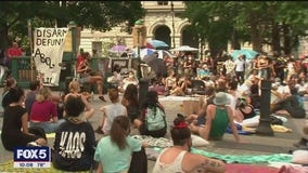 Protesters spend third night outside NY City Hall demanding $1B in cuts to NYPD