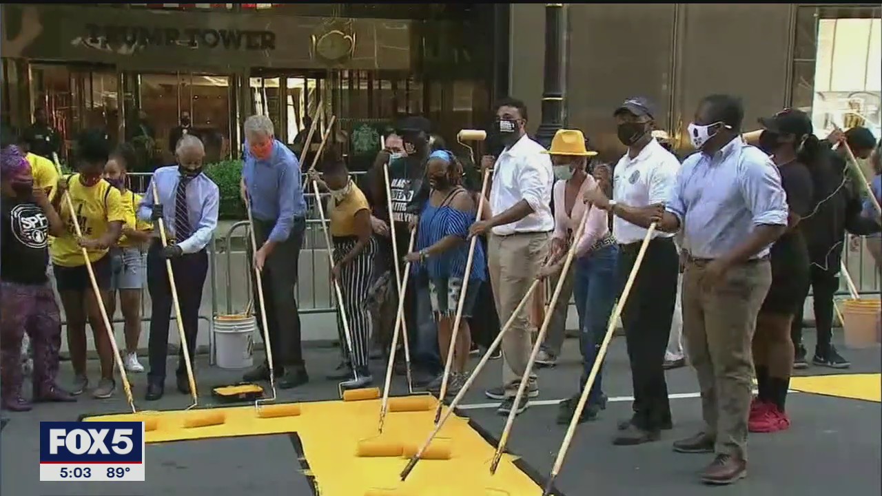 De Blasio helps paint Black Lives Matter mural outside Trump Tower