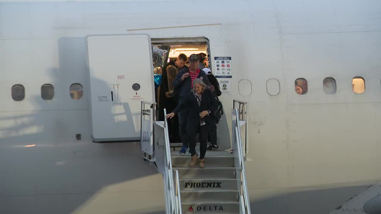 Braves step off plane in Atlanta