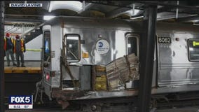 Subway train hits debris and derails