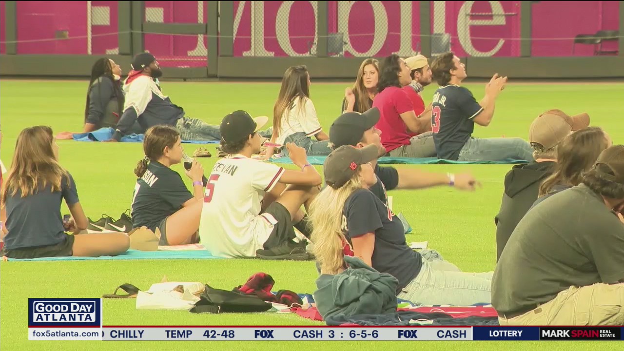 Braves fans watching the game from field pods