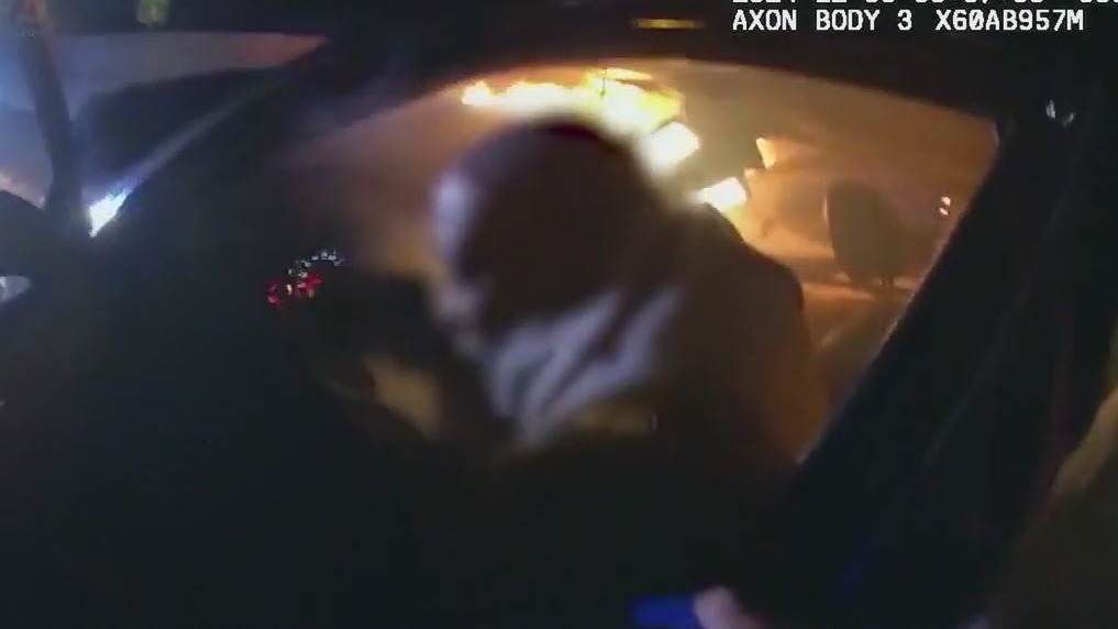 Cobb County officer saves man from burning car | FOX 5 Atlanta