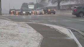 Snow accumulating in Covington