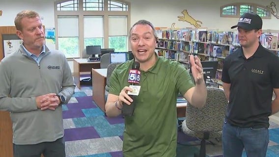 NASCAR driver shares love of reading in Henry County