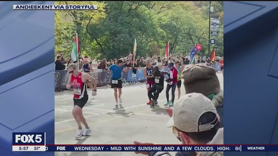 Strangers carry runner over NYC Marathon finish line