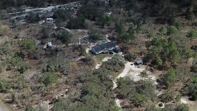 Campers interact with farm animals in Dunnellon