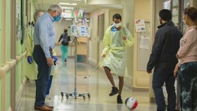 After transplant, teen and surgeon play soccer in hospital hallway