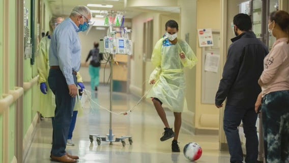 After transplant, teen and surgeon play soccer in hospital hallway