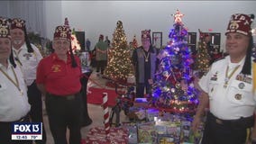 Christmas tree decorating early for a good cause