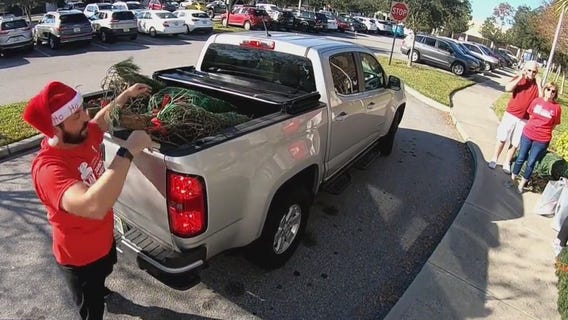 YMCA volunteers help play Santa to hundreds of St. Pete children