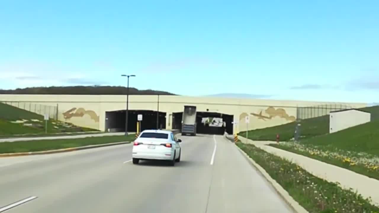Dump truck with bed in the air strikes bridge | FOX 32 Chicago