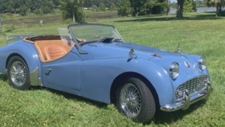 1959 Triump TR3 and 1955 Thunderbird