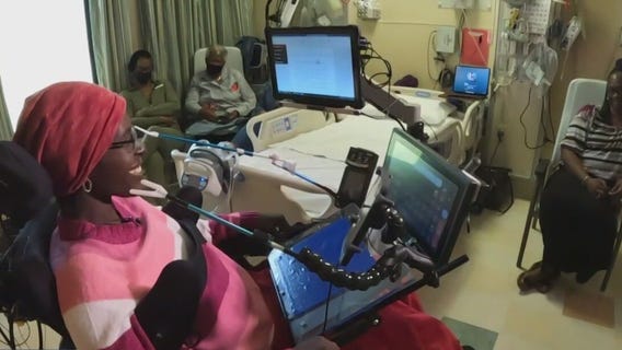 Paralyzed veteran earns master's degree