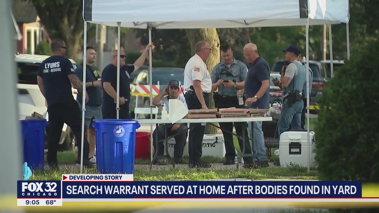 Search warrant served at suburban home after bodies found in yard