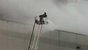 Crews battle warehouse fire in Bartlett