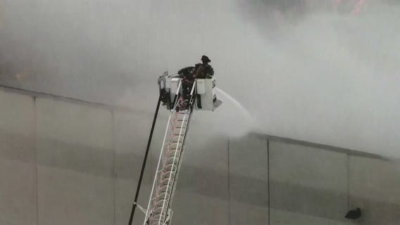 Crews battle warehouse fire in Bartlett