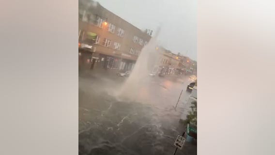 Severe flooding in Chicago's Albany Park neighborhood sends water jetting into air