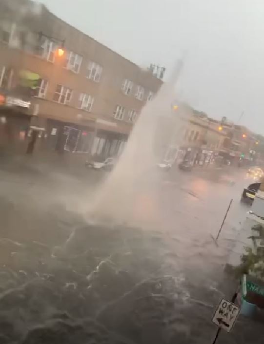 Severe flooding in Chicago's Albany Park neighborhood sends water jetting into air