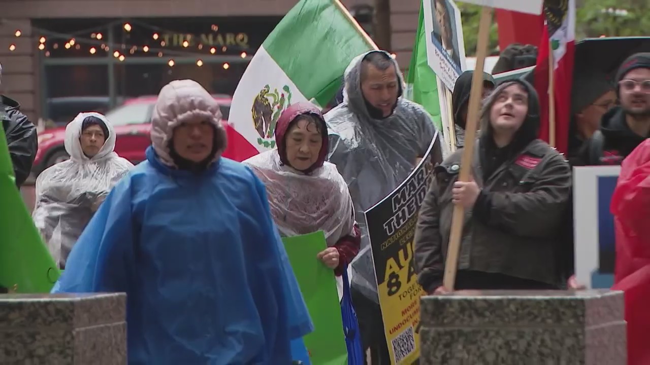 Immigrants march into Chicago, demand citizenship and more