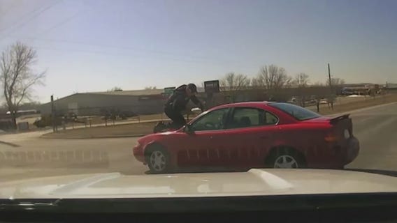Cop clings to hood of car during chase, suspect sentenced