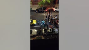 Video captures group of people jumping on car in Lake View
