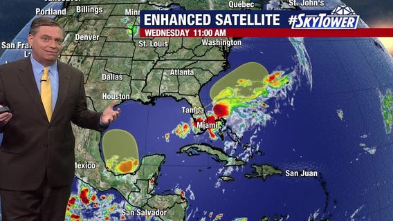 Forecasters monitoring 2 disturbances
