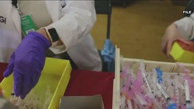 Health officials urge people to get their flu and COVID booster shots amid low numbers