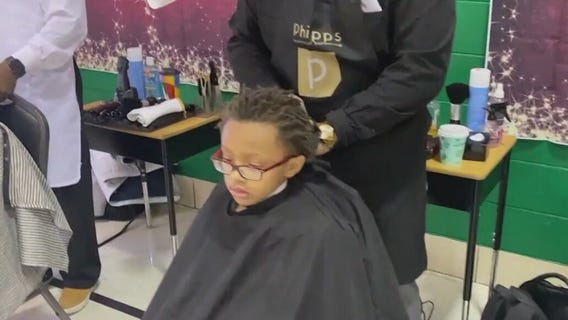 Phipps Academy of Barbering give free haircuts to Park Forest students