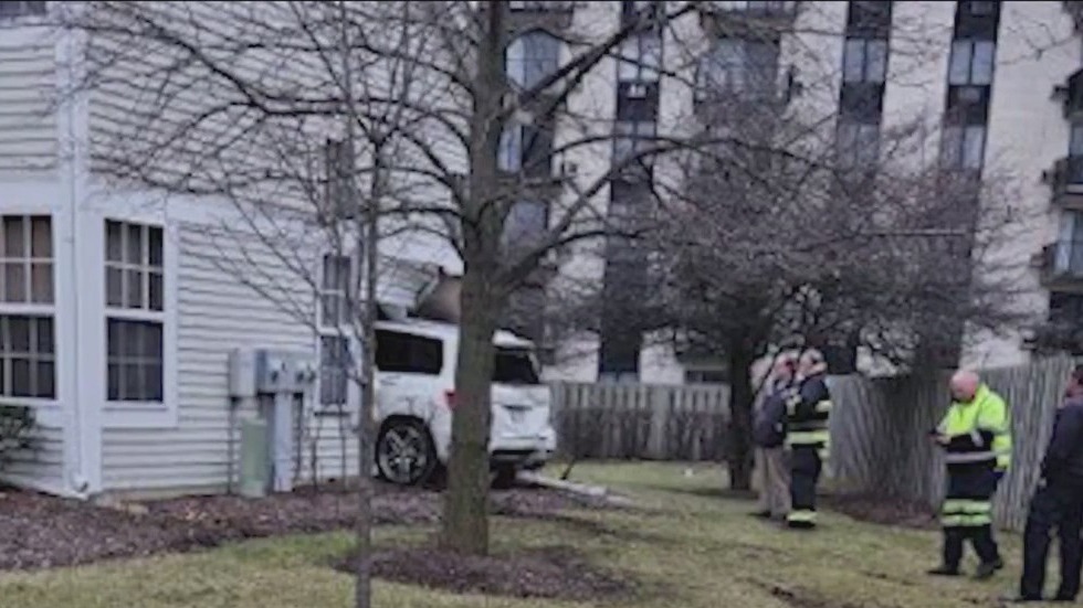 Suburban family files lawsuit after car crashes into living room