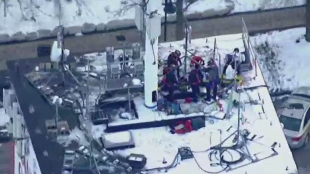 Crews working to rescue contractor on roof of Frankfort Grainery tower