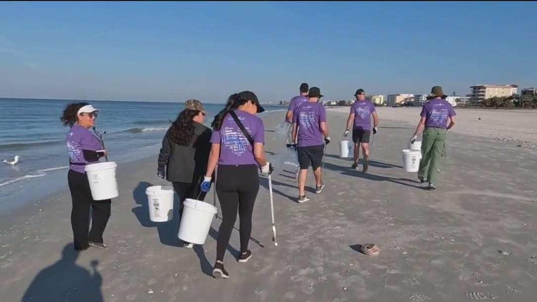 Clearing litter and debris from Pinellas beaches