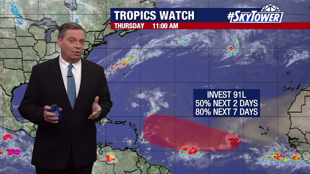 Tropical wave in Atlantic treks west