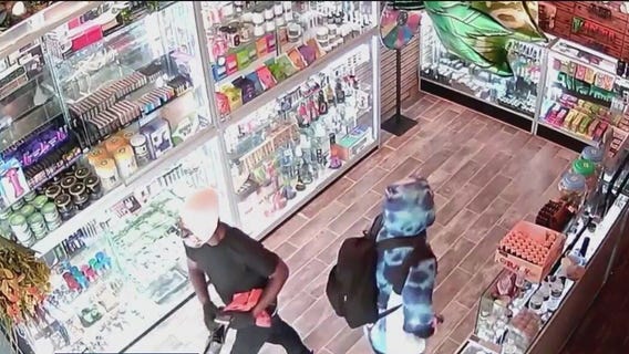 Smoke shop employee robbed at gunpoint