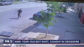 Surveillance video shows people running for cover as shots ring out, striking child
