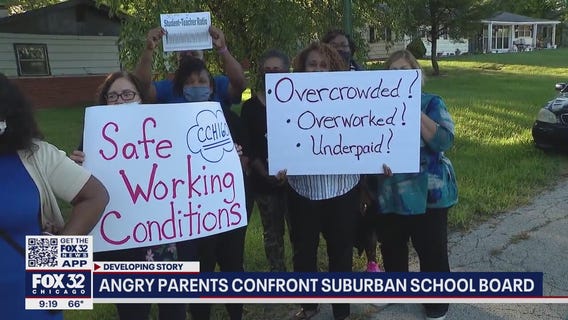 Angry parents confront suburban school board