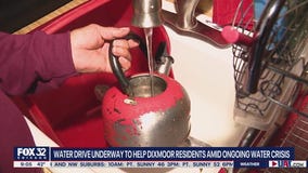 Dixmoor enters 7th day of water woes, neighboring communities pitch in to help