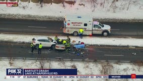 Three-car crash in Bartlett shuts down road, people stuck in car