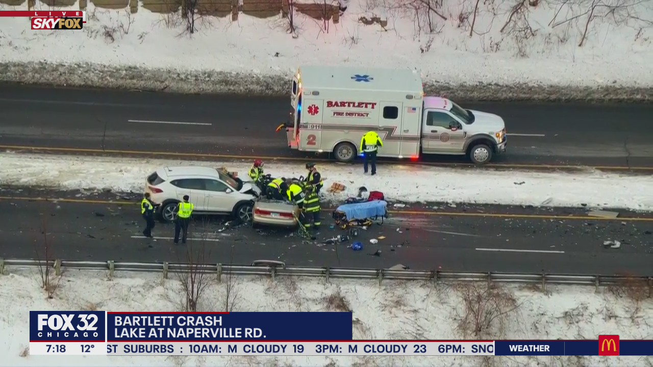 Three-car crash in Bartlett shuts down road, people stuck in car